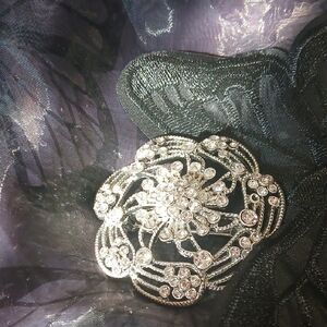 Elegant Silver Floral Brooch
